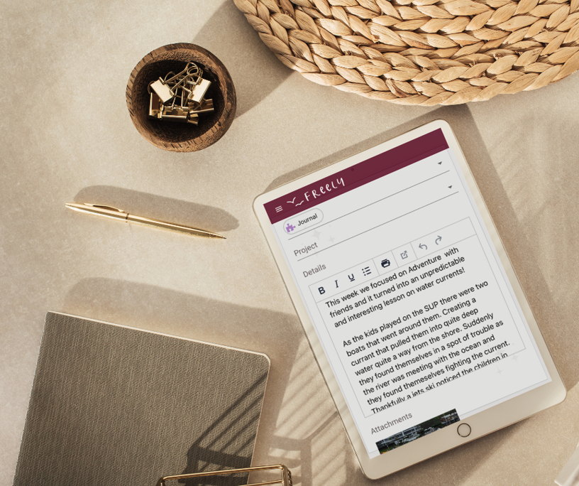Screenshot. Tablet on desk. Freely Homeschool Planner App